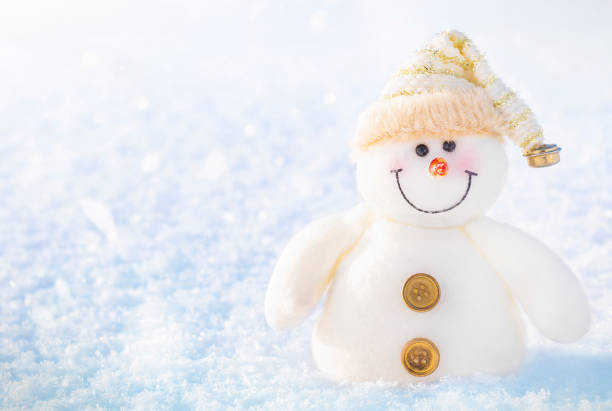 istock snowman in the snow 1297036320