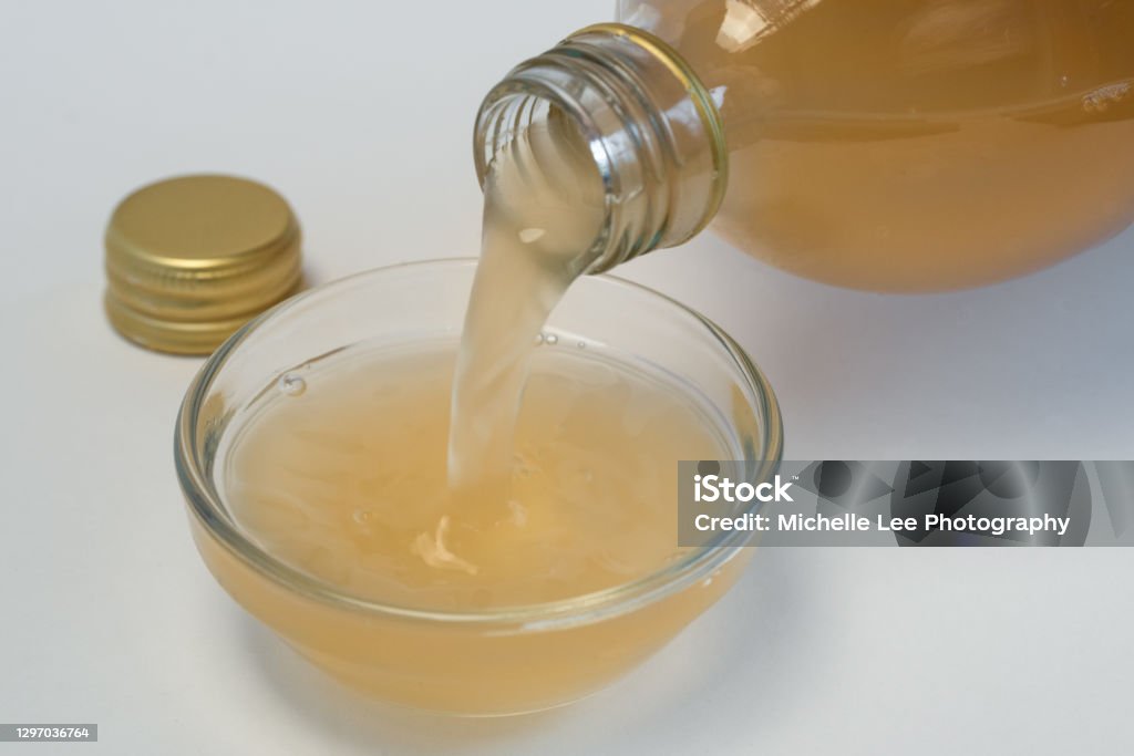Apple Cider Vinegar in a Bowl Vinegar Stock Photo