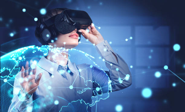 istock Woman in VR glasses in office, network interface 1297037705