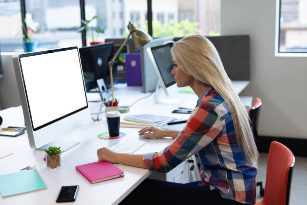 istock Caucasian businesswoman working in creative office 1297038333