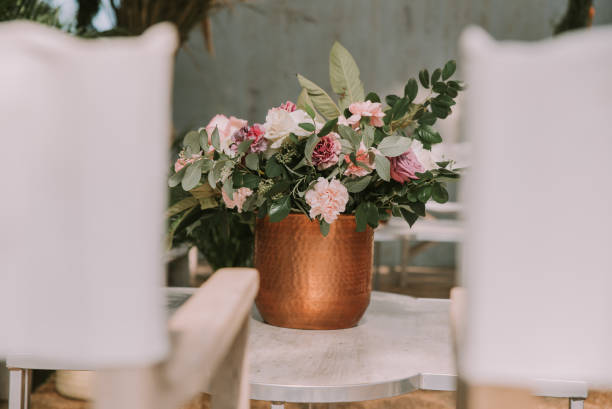istock Table with white tablecloth, wooden plates and candles 1297039471