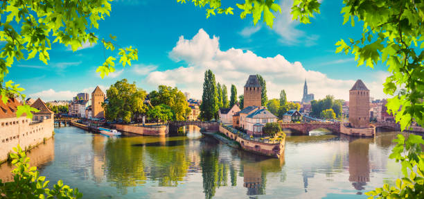 Panorama of Covered Bridges Panorama of Covered Bridges and river Ill in Strasbourg La Petite France stock pictures, royalty-free photos & images