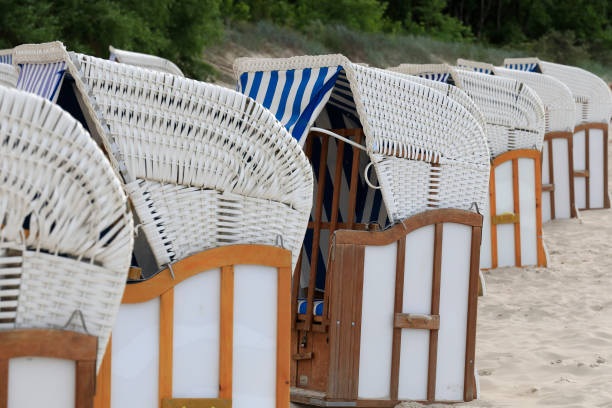 istock Beach chairs in booth shape on the beach in Kolobrzeg 1297042922