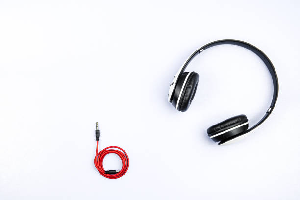 istock top view of headphones on white background 1297044011