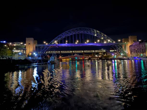 istock The Tyne Bridge at Night by River 1297045973