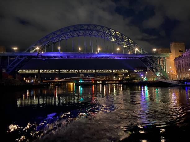 istock The Tyne Bridge at Night by River 1297045986