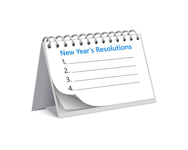 istock flip calendar with tasks and resolutions that should start to do with new year. Sheet with goals that you fill out and start. Concept of new beginnings 1297047270