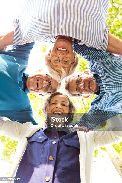 Faces Of Happy Seniors Stock Photo - Download Image Now - Senior Adult, Circle, Directly Below