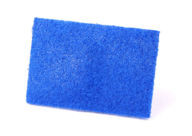 istock Kitchen washcloth for cleaning isolated on a white background. Colorful sponge 1297050287