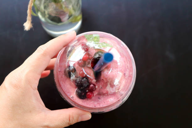 istock strawberry yogurt smoothie, mixed berry smoothie 1297051589