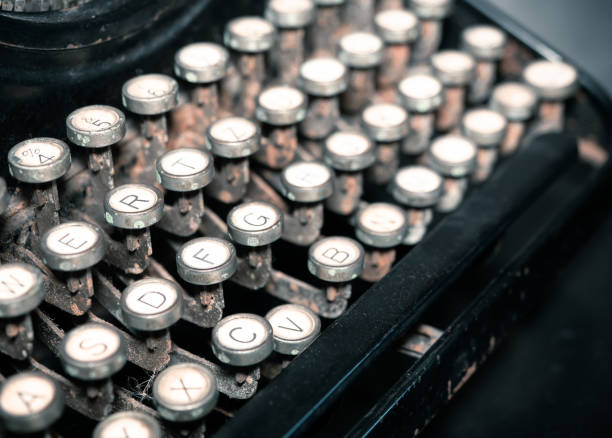 istock Close up of vintage fashioned typewriting machine. 1297053087