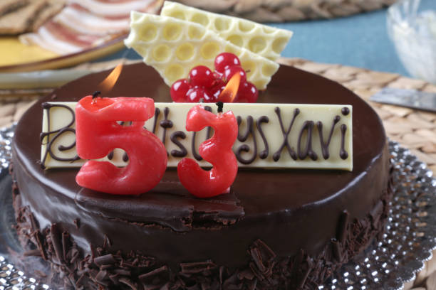 istock 53 chocolate birthday cake with candles 1297053326