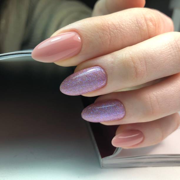 istock Bright multi-colored design of manicure.Multicolored manicure close up 1297057200
