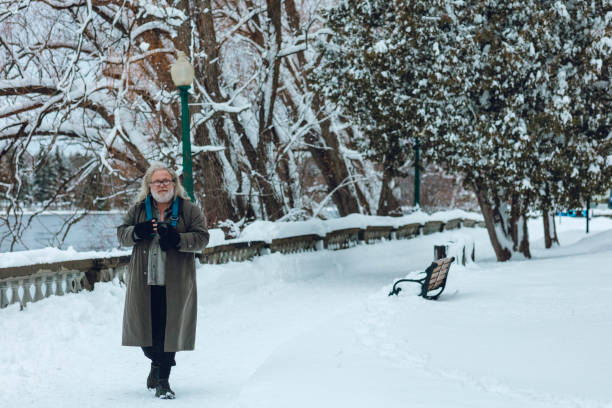 istock With the COVID lockdown still going on, before the 8 PM to 5 AM curfew, a man is walking in a park. 1297062509