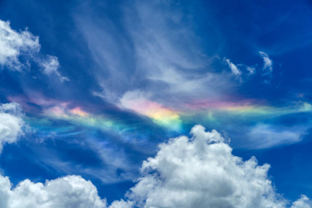 Iridescent cloud over the road to Stelvio pass, Sondrio province, Lombardy, Italy, at summer.