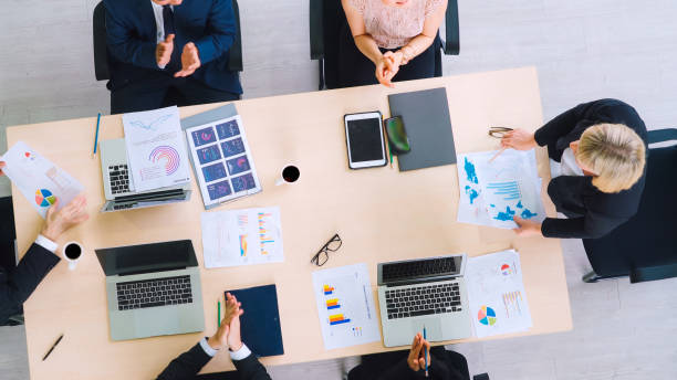 istock Business people group meeting shot from top view 1297064174