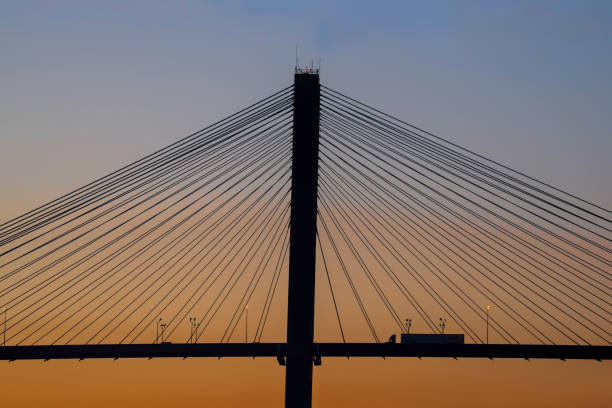 A silhouette of the Talmadge Bridge over the Savannah River at dusk, Savannah, Georgia