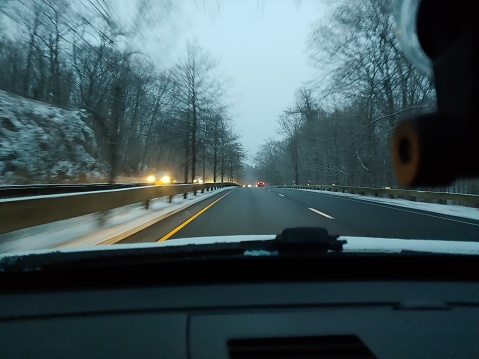 Merritt Parkway in Connecticut on morning winter commute. Taken by dashboard phone cam.