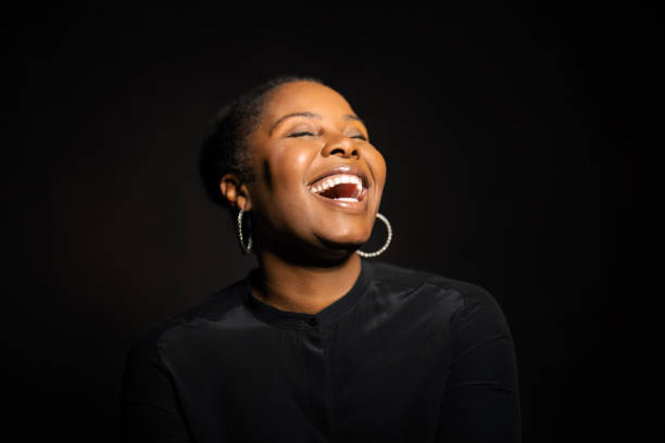 istock Laughing african american woman 1297068595