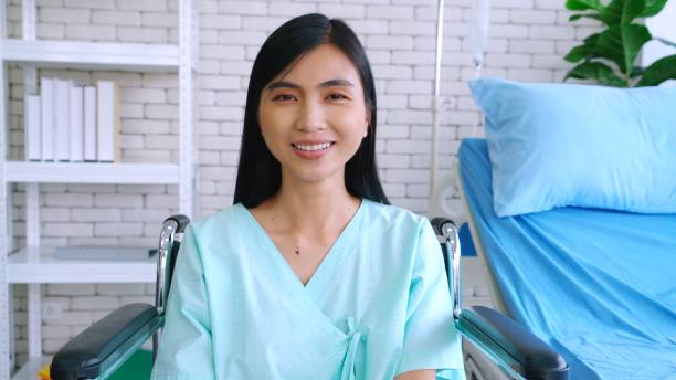 istock Happy patient getting well improvement at hospital 1297068759