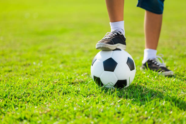 istock Child Hold the Ball 1297069897