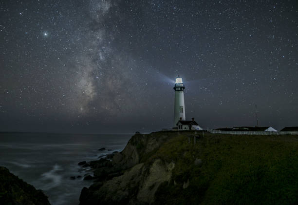 Milky Way over Pigeon Point Lighthouse stock photo