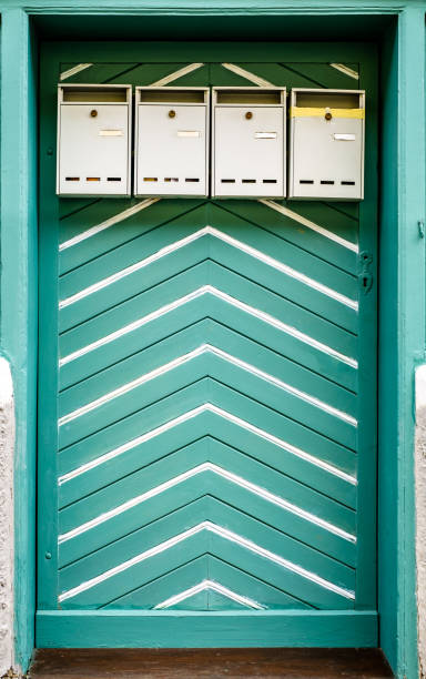 istock old letterbox at a door 1297070564