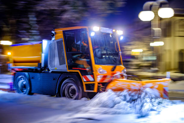 truck cleaning the streets in winter truck cleaning the streets in winter - germany winterdienst stock pictures, royalty-free photos & images