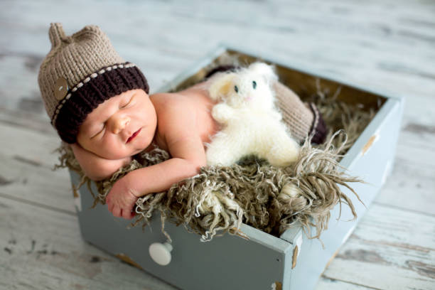 istock Newborn baby boy, sleeping happily 1297072102