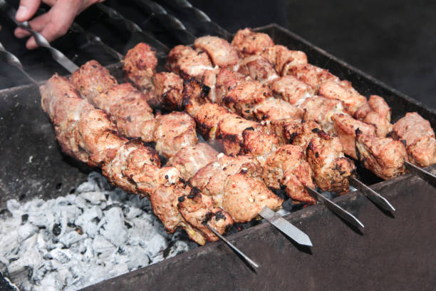 istock Cooking kebabs in the rain 1297073139