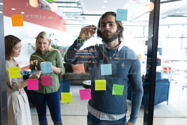 istock Diverse group of business people working in creative office 1297076404