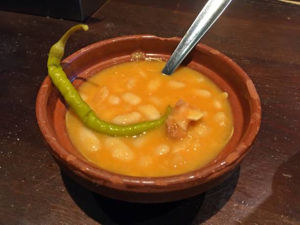 istock Spicy chili and white beans stew. 1297077109