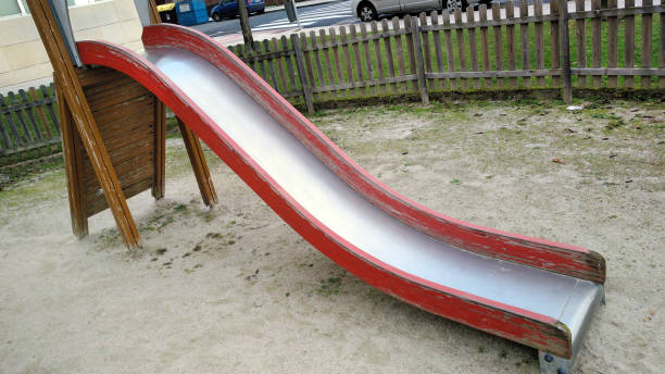 istock Children playground,  slide . 1297078979