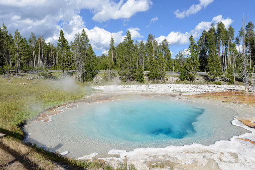 View of small blue hot spring at  Yellowstone National Park