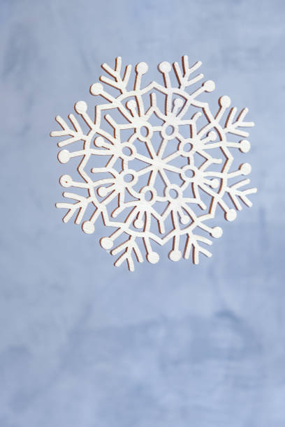 istock Wooden homemade boho style decorations on blurred background, minimalistic scandinavian decor, selective focus 1297087698