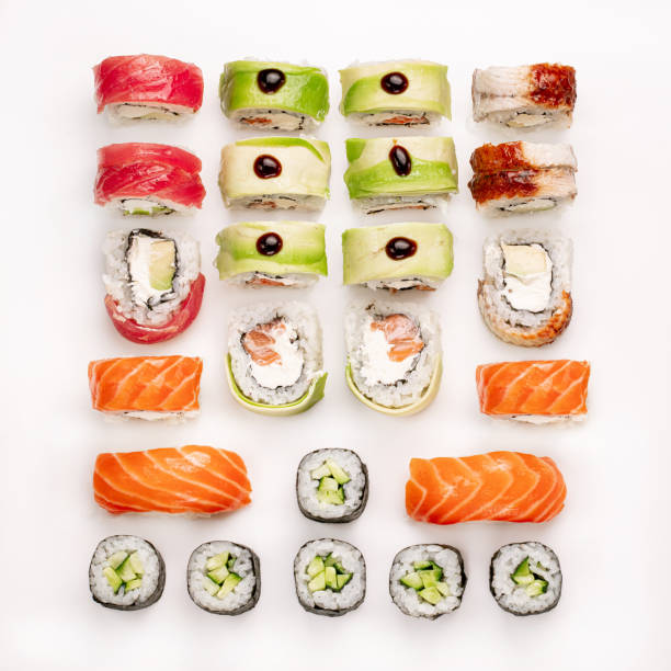 istock Big colorful sushi set on a white background. Top view 1297090342