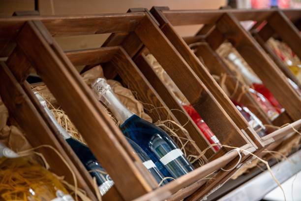 istock Bottles of different wine in wooden box, 1297091686