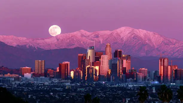 Los Angeles Skyline at dawn with the full moon rising