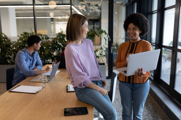 istock Diverse group of business people working in creative office 1297105137