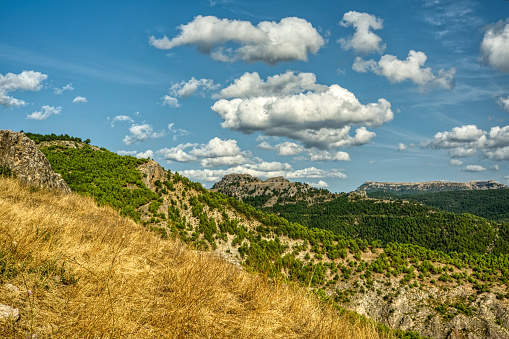 views of the landscape of Segura de la Sierra located in the Natural Park of the Sierras de Cazorla, Segura y las Villas, Spain. In cloudy day