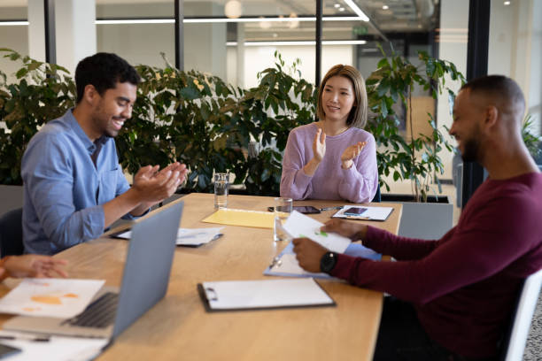istock Diverse group of business people working in creative office 1297111729