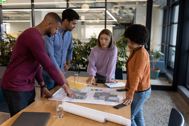 istock Diverse group of business people working in creative office 1297112641