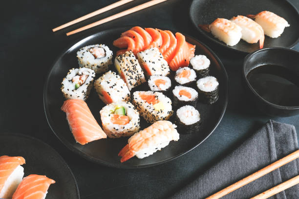 istock Set of sushi and rolls with salmon and shrimp 1297112649