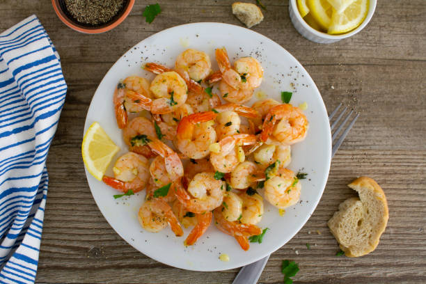 istock Shrimp with garlic and herbs 1297118831