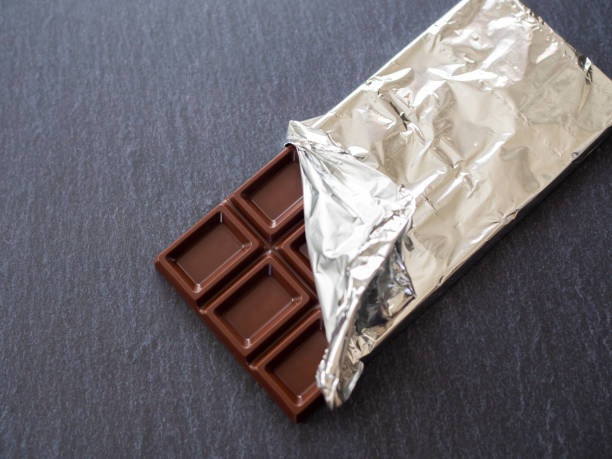 istock Chocolate bar in aluminum foil 1297119787