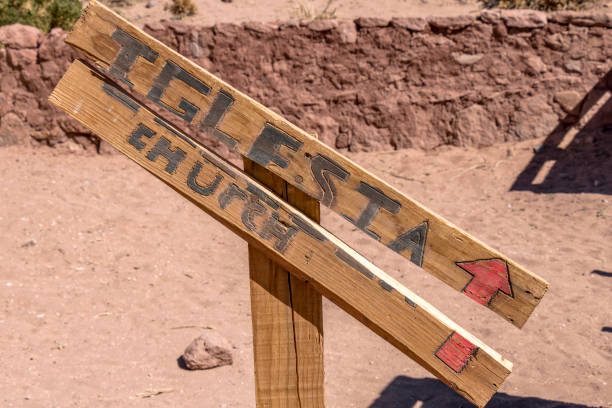 istock Church direction sign in Machuca, Atacama Desert, Chile. 1297121642