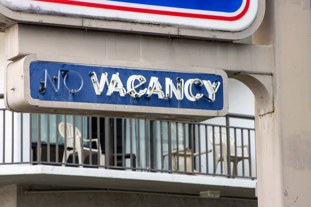 istock White neon no vacancy sign hotel balcony 1297122271