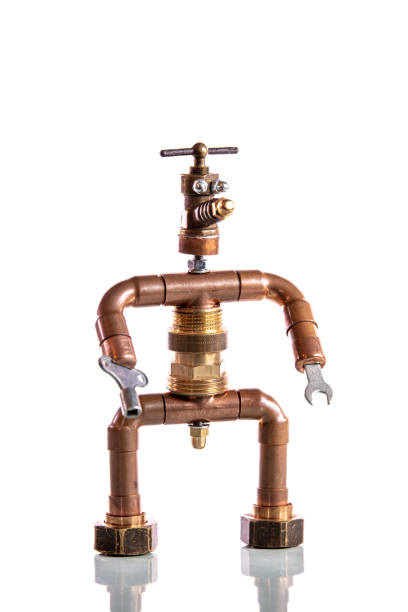 istock funny miniature craftsman, built from tools and materials, concept heating engineer or installer 1297134567