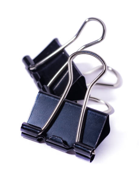 istock Black Paper clip isolated on white background. 1297136260