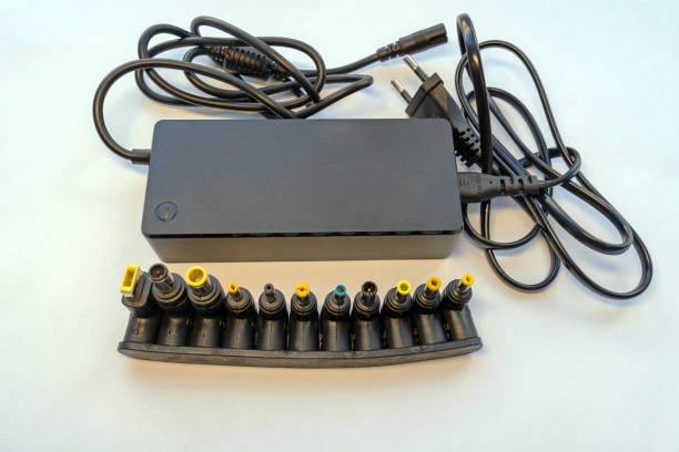 istock Universal power supply for mobile devices on gray background 1297138906